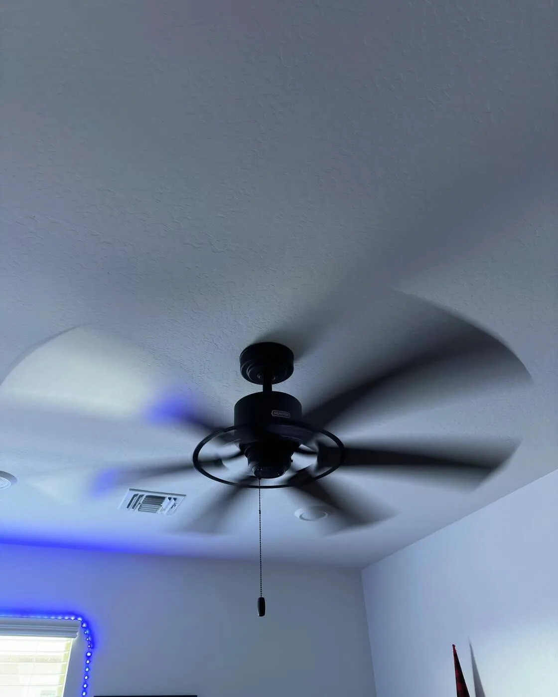 Matte black industrial cage ceiling fan