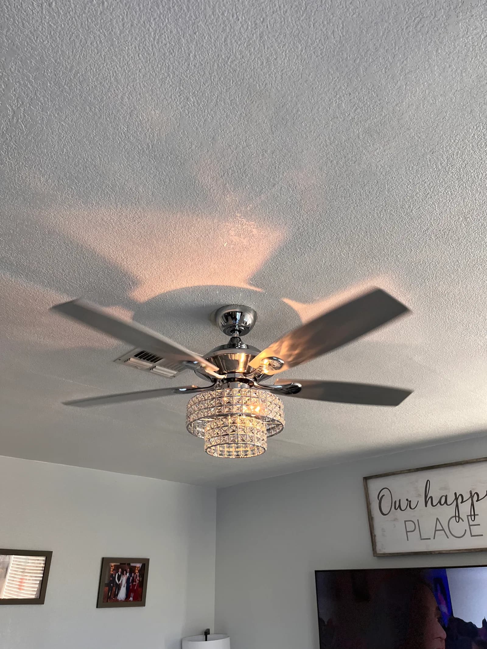 Ceiling fan with a two-tier crystal light kit
